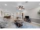 Open living room with view into dining area and kitchen at 324 Wexford Ter # 171, Venice, FL 34293