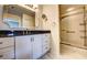 Modern bathroom with granite vanity and walk-in shower at 3730 Cadbury Cir # 400, Venice, FL 34293
