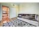 Spacious bedroom with wood floors and access to bathroom at 3730 Cadbury Cir # 400, Venice, FL 34293