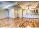 Spacious living room with hardwood floors and an open layout at 3730 Cadbury Cir # 400, Venice, FL 34293
