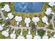 Bird's-eye view of community near a lake at 452 Wexford Cir # 105, Venice, FL 34293