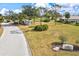 Landscaped entrance to The Plantation community park at 452 Wexford Cir # 105, Venice, FL 34293