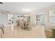 Elegant dining room featuring a glass table and seating for six at 452 Wexford Cir # 105, Venice, FL 34293
