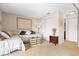 Cozy guest bedroom with twin beds, ample closet space, and decorative accents at 452 Wexford Cir # 105, Venice, FL 34293