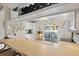 Well-equipped kitchen with ample counter space and a view to the backyard at 452 Wexford Cir # 105, Venice, FL 34293
