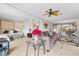 Open living space with seating area and view into the dining area at 452 Wexford Cir # 105, Venice, FL 34293