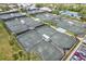 Aerial view of community tennis courts at 452 Wexford Cir # 105, Venice, FL 34293