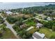 Aerial view of a cute house with a spacious yard, located near the water at 4533 Church St, Punta Gorda, FL 33980