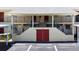 Condo building entrance with stairs and parking at 509 Parkdale Mews # 509, Venice, FL 34285