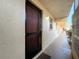 Condo hallway with mailboxes and unit entrance at 509 Parkdale Mews # 509, Venice, FL 34285