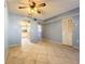 Open living area with tile floors and view of kitchen at 509 Parkdale Mews # 509, Venice, FL 34285