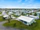 Aerial view of manufactured home community with a home highlighted at 512 Ashwood Dr, Venice, FL 34285