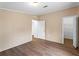 Bedroom with neutral walls and walk-in closet at 512 Ashwood Dr, Venice, FL 34285