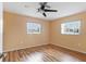 Light and bright bedroom with wood-look floors at 5221 Lemon Bay Dr, Venice, FL 34293