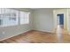 Dining area with hardwood floors and large window at 5221 Lemon Bay Dr, Venice, FL 34293