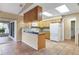 Kitchen with granite countertops and light wood cabinets at 5221 Lemon Bay Dr, Venice, FL 34293