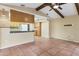 Kitchen with granite countertop and wooden cabinets at 5221 Lemon Bay Dr, Venice, FL 34293