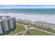 Amazing aerial view of the beach, building and water at 5790 Midnight Pass Rd # 602, Sarasota, FL 34242