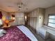 Large main bedroom with a king-size bed and ample closet space at 611 50Th Avenue W Dr, Bradenton, FL 34207