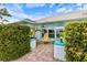 Inviting front patio with seating and landscaping at 6462 Fabian Rd, North Port, FL 34287