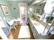 Charming bathroom with updated vanity and large mirror at 727 Blackburn Blvd, North Port, FL 34287