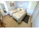 Bright bedroom with twin beds and a mirrored closet at 727 Blackburn Blvd, North Port, FL 34287