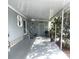 Spacious covered patio with concrete flooring at 727 Blackburn Blvd, North Port, FL 34287