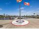 Community dock with flag and waterway access at 727 Blackburn Blvd, North Port, FL 34287