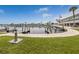 Curved waterfront dock with boat slips at 727 Blackburn Blvd, North Port, FL 34287