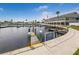 Wooden dock and walkway by the water at 727 Blackburn Blvd, North Port, FL 34287