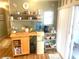 Kitchen with additional counter space and storage at 727 Blackburn Blvd, North Port, FL 34287