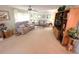 Spacious living room with comfortable seating and large TV at 727 Blackburn Blvd, North Port, FL 34287