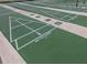 Well-maintained shuffleboard courts for recreation at 727 Blackburn Blvd, North Port, FL 34287