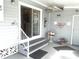 Side patio with access to kitchen and laundry area at 727 Blackburn Blvd, North Port, FL 34287