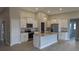 Modern kitchen featuring stainless steel appliances, granite countertops and white cabinets at 14464 Fort Myers Ave, Port Charlotte, FL 33981