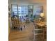 Inviting living room with sliding glass doors to balcony and stylish furnishings and decor at 232 Saint Augustine Ave # 404, Venice, FL 34285