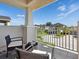 Outdoor patio featuring two chairs with a table and neighborhood views at 5930 Anise Dr, Sarasota, FL 34238