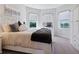 Bedroom with lots of natural lighting from the windows at 5930 Anise Dr, Sarasota, FL 34238