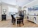 Dining room with a modern chandelier, and stylish sideboard at 5930 Anise Dr, Sarasota, FL 34238