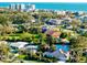 Stunning aerial shot highlighting the lush surroundings and location near the beach at 705 Armada N Rd, Venice, FL 34285