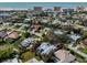 Aerial view showcasing the property's location near the beach, pool, and surrounding neighborhood at 705 Armada N Rd, Venice, FL 34285