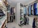 Spacious walk-in closet with custom shelving providing ample storage for clothes and accessories at 705 Armada N Rd, Venice, FL 34285