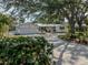 Beautiful home with a spacious driveway and a well-maintained lawn at 705 Armada N Rd, Venice, FL 34285