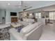 Open-concept living room with dining and kitchen areas at 705 Armada N Rd, Venice, FL 34285