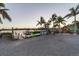 Picturesque waterfront restaurant with docks, kayak rentals, and beautiful sunset views at 107 Louella Ln, Nokomis, FL 34275