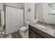 Bright bathroom features a granite vanity, tiled shower with glass door, and modern fixtures at 11601 Parrotfish St, Venice, FL 34292