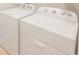 Efficient laundry area with a modern Whirlpool washer and dryer set at 13164 Rinella St, Venice, FL 34293