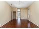 Spacious bedroom with hardwood floors and natural light from the window at 1348 Reserve Dr, Venice, FL 34285