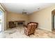 Living room features tile floors, a fireplace and access to the pool area at 1348 Reserve Dr, Venice, FL 34285