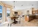 Open concept living space combines a dining area, Gathering room, and kitchen at 1348 Reserve Dr, Venice, FL 34285
